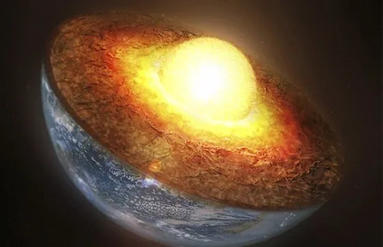 A picture of the earth cut in half, the core glowing
